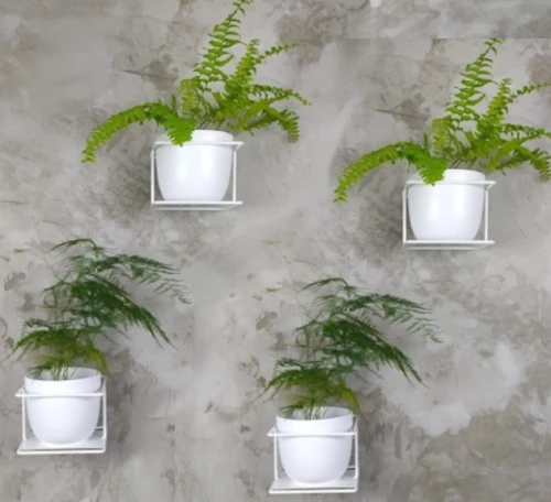 zestaw białych kwietników na ścianę