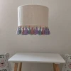 Lampa do pokoju dziecka Ozdobny klosz chwosty
