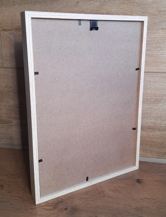 Dekoracja handmade w ramce z chrobotkiem